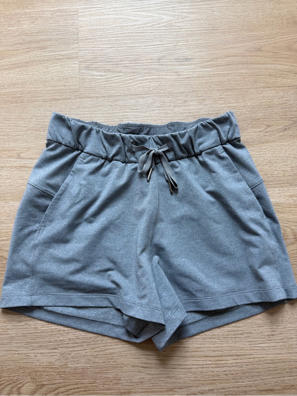 Lululemon Grey Shorts with pockets & elastic band.
